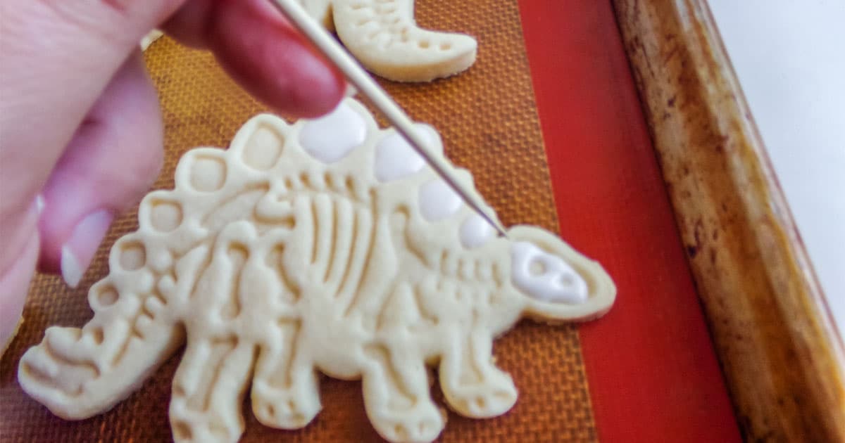 using a toothpick to make details pop on fossil cookies